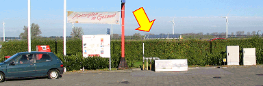Standing on the terrain of an archaic gas station on the north rim of Waalwijk, with view towards the southward facing 737.1 kWp  PV-plant of Ecopark Waalwijk (arrow).