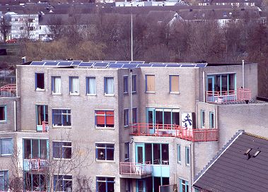Open frame-mounted photo-voltaic solar panels (2316 Wp) on  flat roof of "Centraal Wonen Stevenshof" project,  Leiden (NL)